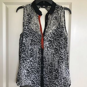 Sleeveless button down open back shirt